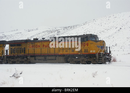 yellow Union Pacific freight train engine pulling a load Stock Photo ...