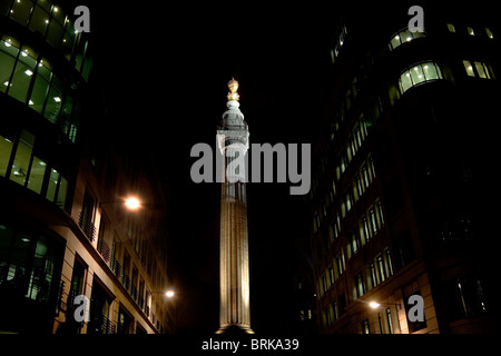 Night view of The Monument in the City of London Stock Photo