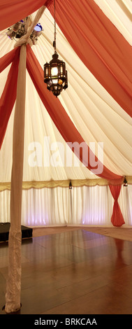 inside a marquee which has fabric lining ready for a party Stock Photo