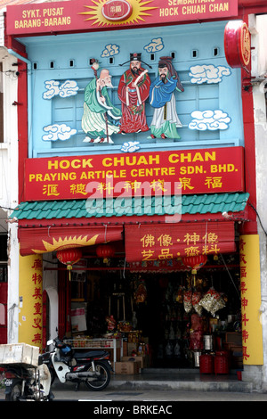 The colorful exterior of the Hock Chuah Chan Praying Article Centre adorns the Georgetown district in Penang, Malaysia. Stock Photo