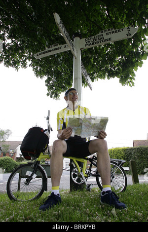 Travel writer Simon Calder rest in Horsmonden during his cycle ride along the Tour de France route. Picture by James Boardman Stock Photo
