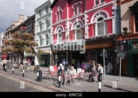 Street scene with pavement cafe outside the Royal Arcade in the city centre. St Mary Street, Cardiff (Caerdydd), Glamorgan, South Wales, UK. Stock Photo