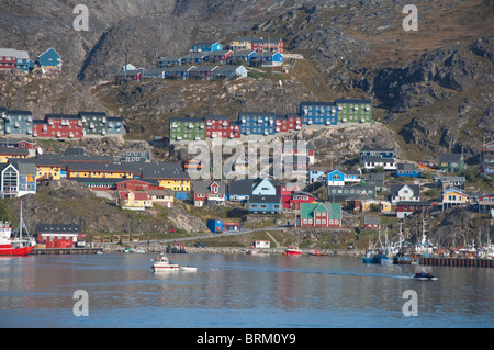 Greenland, Qaqortoq. South Greenland's largest town with almost 3,000 inhabitants. Coastal view of port area. Stock Photo