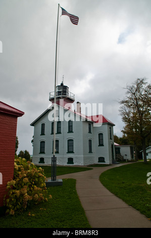Grand Traverse Lighthouse Located inside the Leelanau State Park in Northern Michigan, The Grand Traverse Lighthouse has been gu Stock Photo