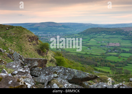 Rolling countryside looking towards Abergavenny from the summit of The Skirrid (Ysgyryd Fawr) mountain, Brecon Beacons Stock Photo