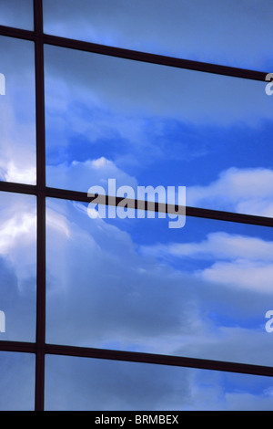 Storm clouds reflected in window. Stock Photo