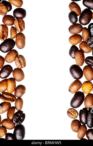 Brown coffee beans isolated on white background Stock Photo - Alamy