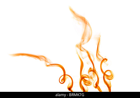 bright orange smoke trickling upward in spirals Stock Photo