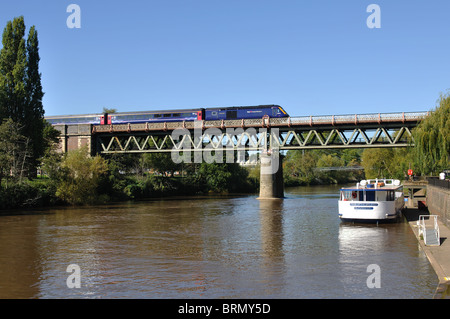 Train on bridge crossing River Severn, Worcester, Worcestershire, England, UK Stock Photo