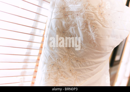 bust of a wedding dress details close up Stock Photo