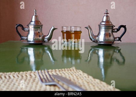 MARRAKESH: TRADITIONAL MOROCCAN MINT TEA AND SILVER TEA POT Stock Photo