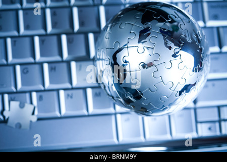Globe made from puzzle Stock Photo