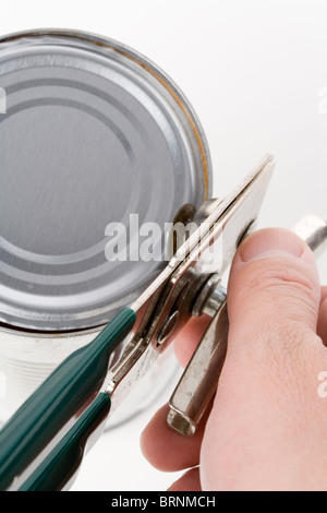 Metal Can and opener with white background Stock Photo