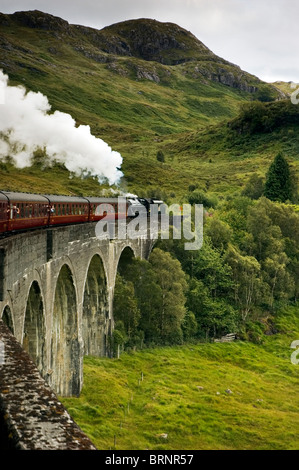 Jacobite Steam Train Glenfinnan Viaduct Scotland Train Crossing jacobite-steam-train-glenfinnan-viaduct-scotland-train-crossing