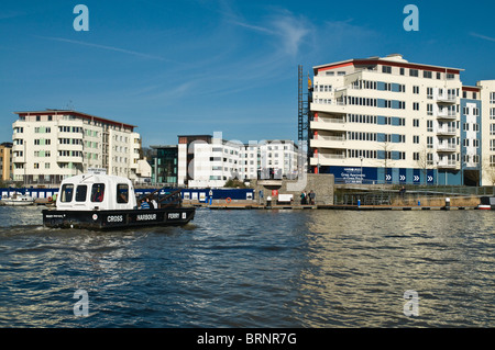 dh Port of Bristol BRISTOL DOCKS BRISTOL Ferryboat crossing harbour luxury dockside apartment flats waterfront Stock Photo