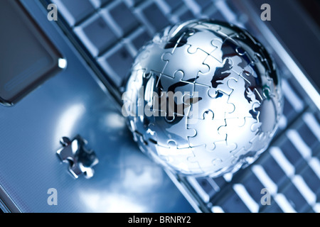 Globe made from puzzle Stock Photo