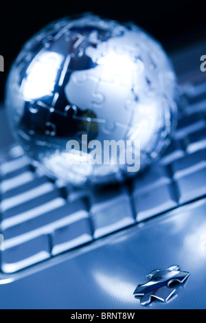Globe made from puzzle Stock Photo