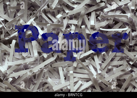 close up detail image of shredded paper with the words paper printed on it Stock Photo