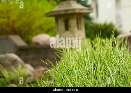 Japanese garden with stone pagoda Stock Photo