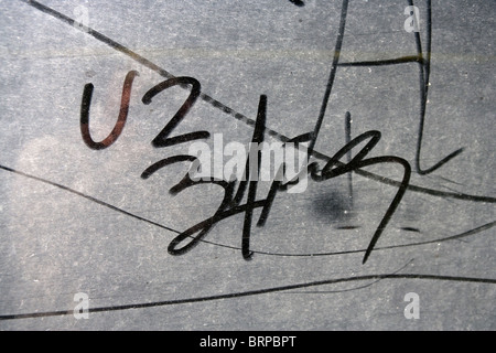 U2 live 360 tour, fan message written in dust on a truck stage transporter. Stock Photo