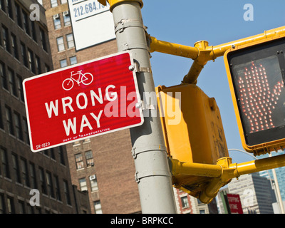 'Wrong Way' Street Sign,'Don't Walk' Warning , NYC Stock Photo