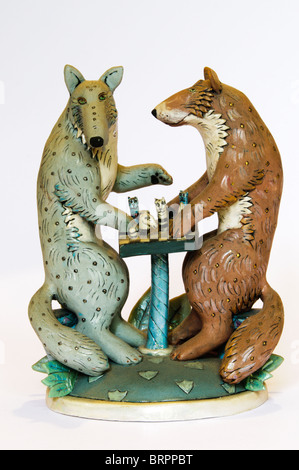 Ceramic of two foxes playing chess, by Eleanor Bartleman. Stock Photo