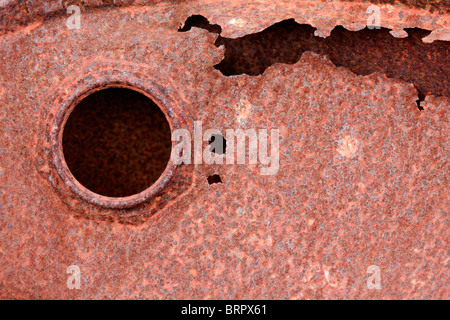 Rusted top of an oil drum with interesting texture Stock Photo
