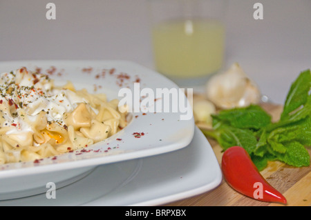 Turkish food manti filled with spiced meat mixture Stock Photo