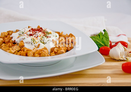 Turkish food manti filled with spiced meat mixture Stock Photo