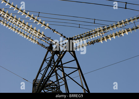 Electricity pylon from below. Insulators Stock Photo
