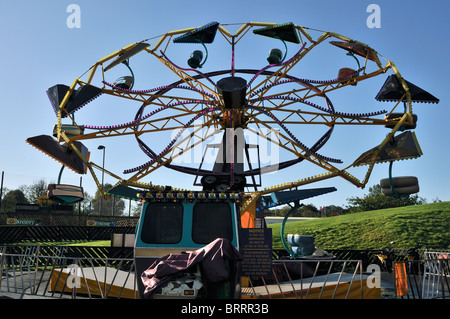 The Paratrooper ride glistening in early morning sunshine at the amusement park, Primrose Valley Holiday Park, Filey Stock Photo