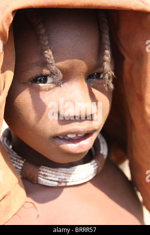 Himba people in the remote Opuwo region of Namibia Stock Photo