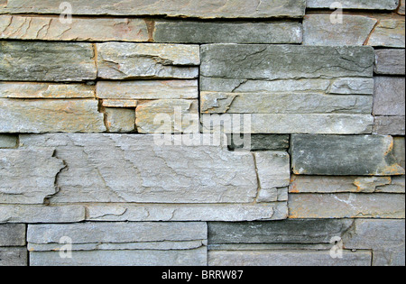 yellow and grey brick lined and textured background Stock Photo
