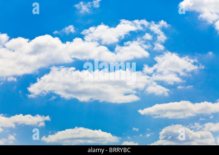 blue sky with white fluffy clouds background