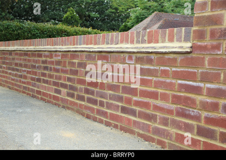Newly constructed brick wall at the front of a house. Stock Photo