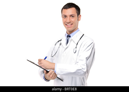 A portrait of a smiling medical doctor writing down notes in a notebook Stock Photo