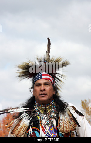 A Native American Indian man in full powwow dress Stock Photo