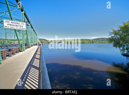 Riding Prohibited - Walk Bikes on Footwalk. Scene of a bridge over the Delaware River in New Jersey Stock Photo