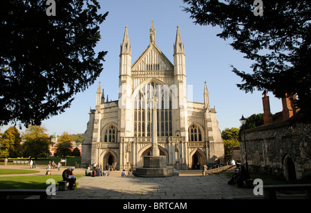 Winchester Cathedral west front entrance and surrounding grounds situated in Winchester city centre Hampshire southern England Stock Photo
