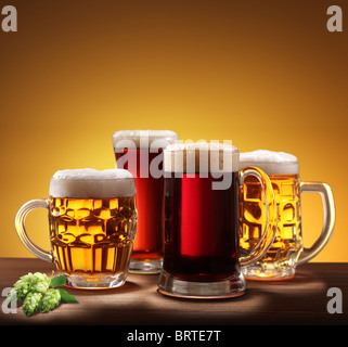 Still-life with beer glasses. On a yellow background.