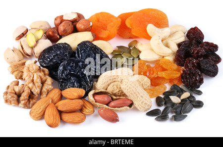 Group of different dried fruits and nuts on a white background. Stock Photo