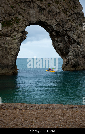 Kayaks in the sea at Durdle Door Dorset England UK Stock Photo