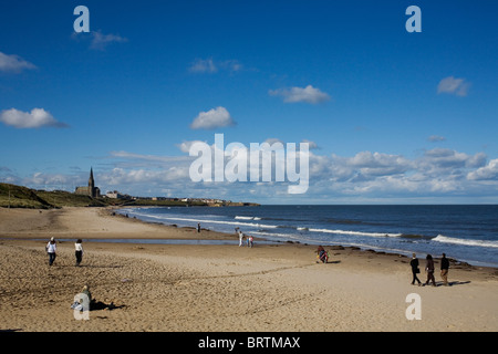People on Tynemouth Long Sands beach, Tyne and Wear. Stock Photo