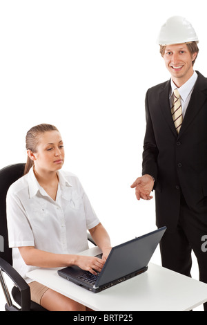 Two businesspeople working with laptop at office Stock Photo
