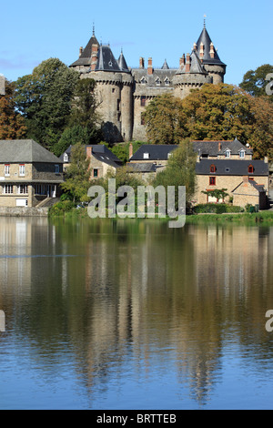 The Château de Combourg, reflected in the waters of Lac Tranquille, in Brittany, northern France Stock Photo