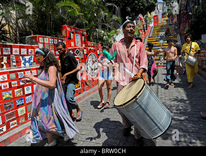 People play instruments on Escadaria Selarón the set of world-famous stairs by artist Jorge Selarón Stock Photo