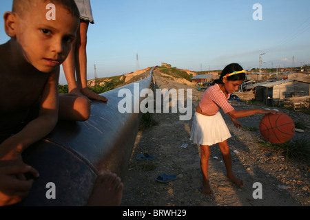 kids playing in a slum in Colombia Stock Photo