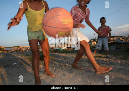 kids playing in a slum in Colombia Stock Photo