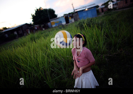 kids playing in a slum in Colombia Stock Photo