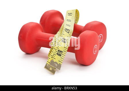 Red Dumbbell and Tape Measure close up shot Stock Photo